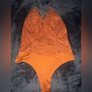 Orange bodysuit